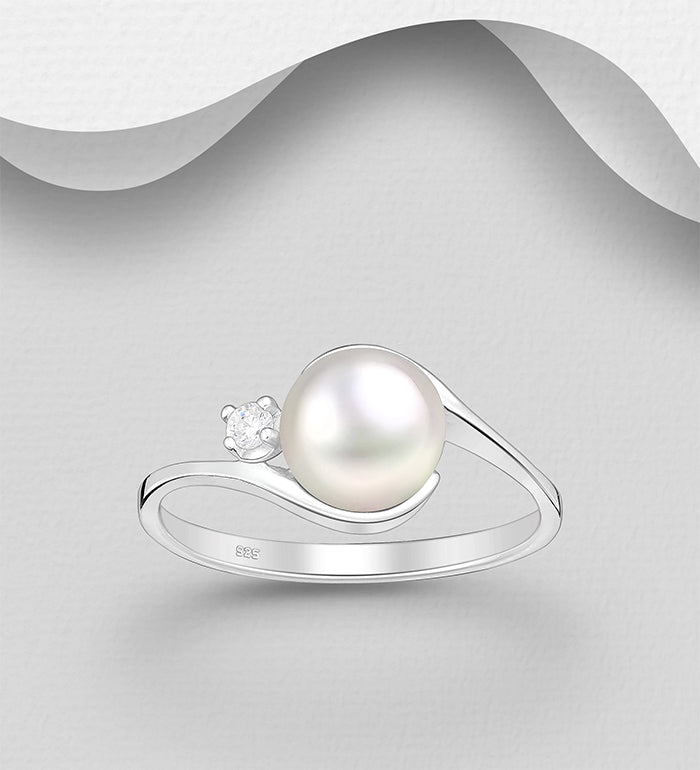 Sterling Silver Freshwater Pearl Ring decorated with a solitaire Cubic Zirconia