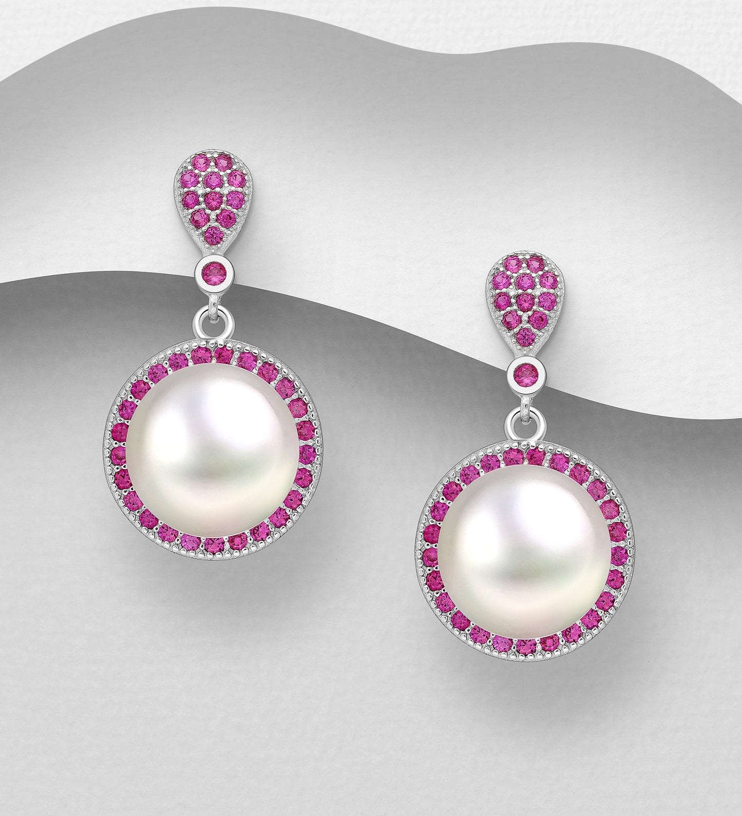 Sterling Silver Push Back Freshwater Pearl earrings decorated with Cubic Zirconia