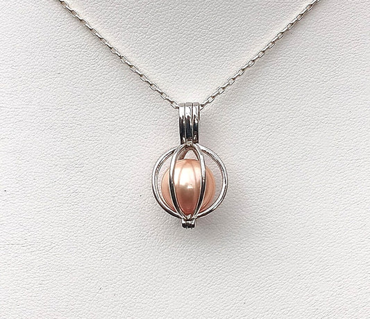 Freshwater Round Pearl set inside a Sterling Silver Cage Pendant