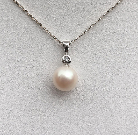 Freshwater Pearl Pendant set in Sterling Silver & decorated with Cubic Zirconia
