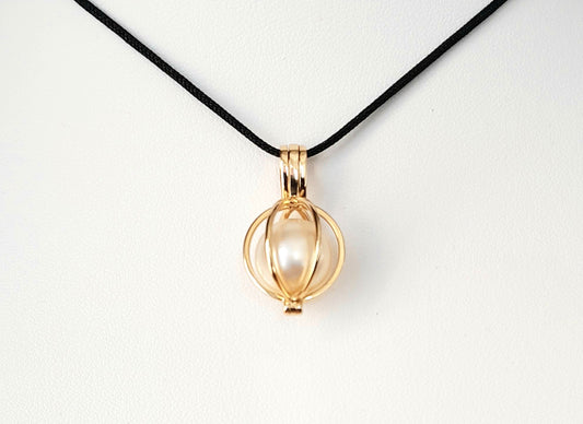 Freshwater Pearl enclosed in a 9k Gold Cage Pendant