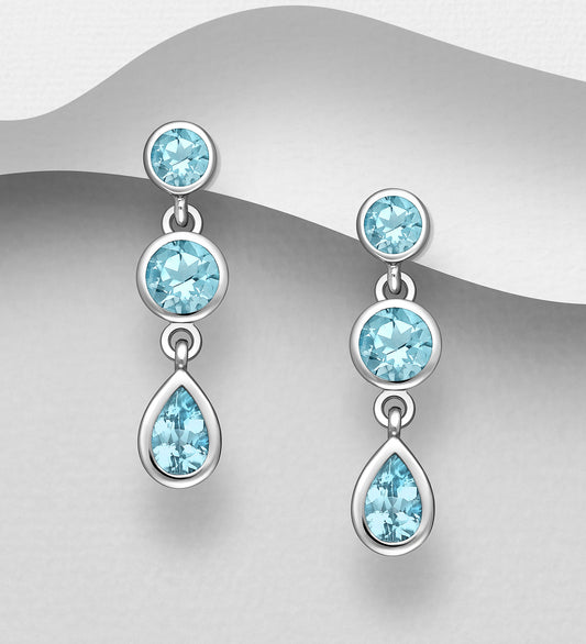 Sterling Silver Push Back Earrings decorated with Sky Blue Topaz